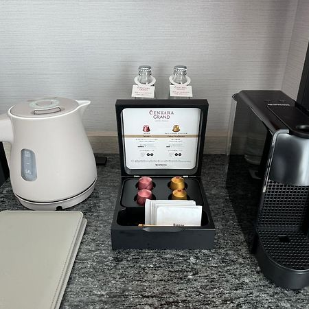 Centara Grand Hotel Осака Экстерьер фото A Nespresso coffee machine in a hotel room